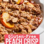 Gluten-free peach crisp with oats, almonds, and coconut.