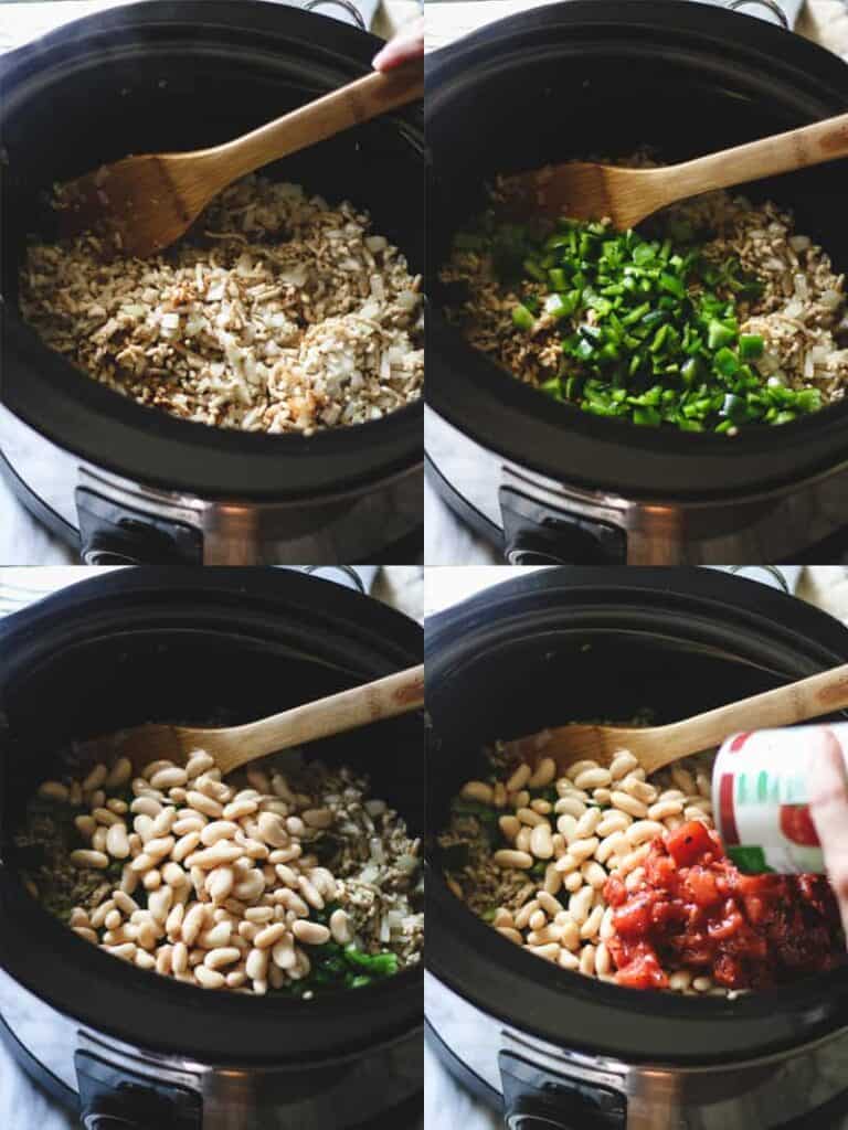 Black slow-cooker with ground chicken, peppers, cannellini beans and tomatoes