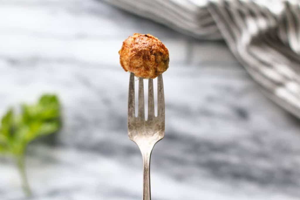 Baked Chicken Meatball on a fork