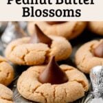 Gluten free peanut butter blossom cookies on a vintage starburst metal tray.