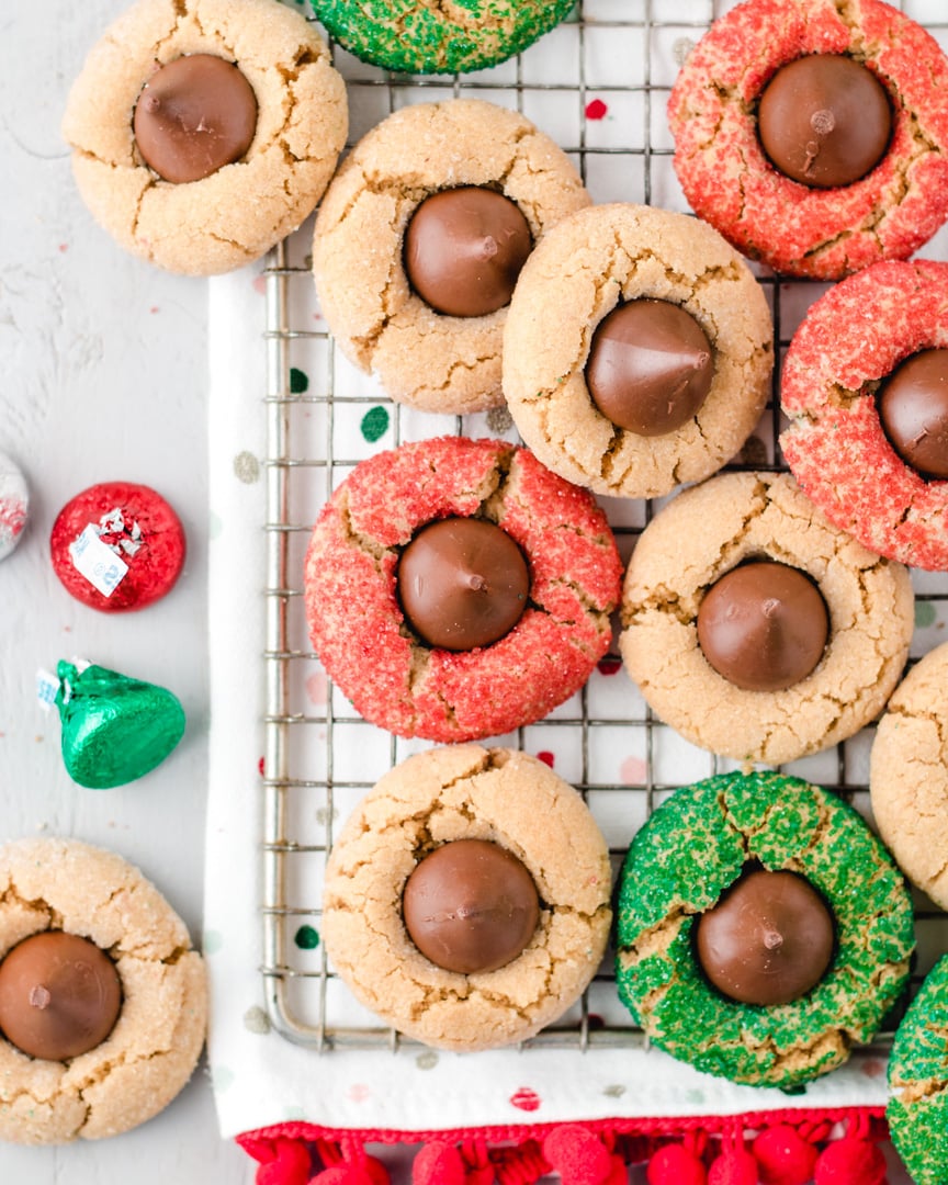 Peanut butter blossoms rolled in festive red and green colored sugar.