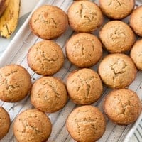 gluten free whole grain banana muffins on a wire rack