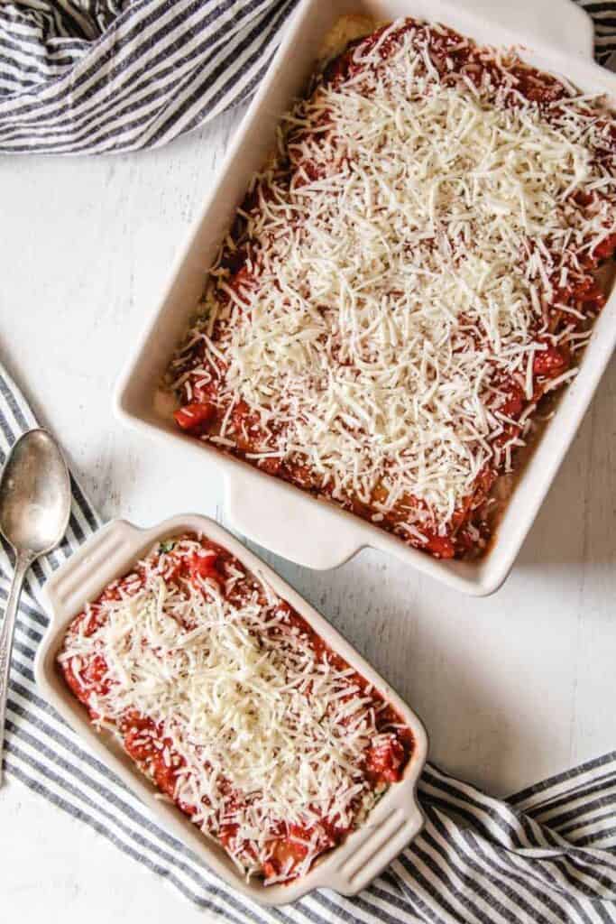 Two pans of gluten-free lasagna, uncooked.
