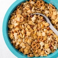 Gluten-free chex mix in a large blue bowl.