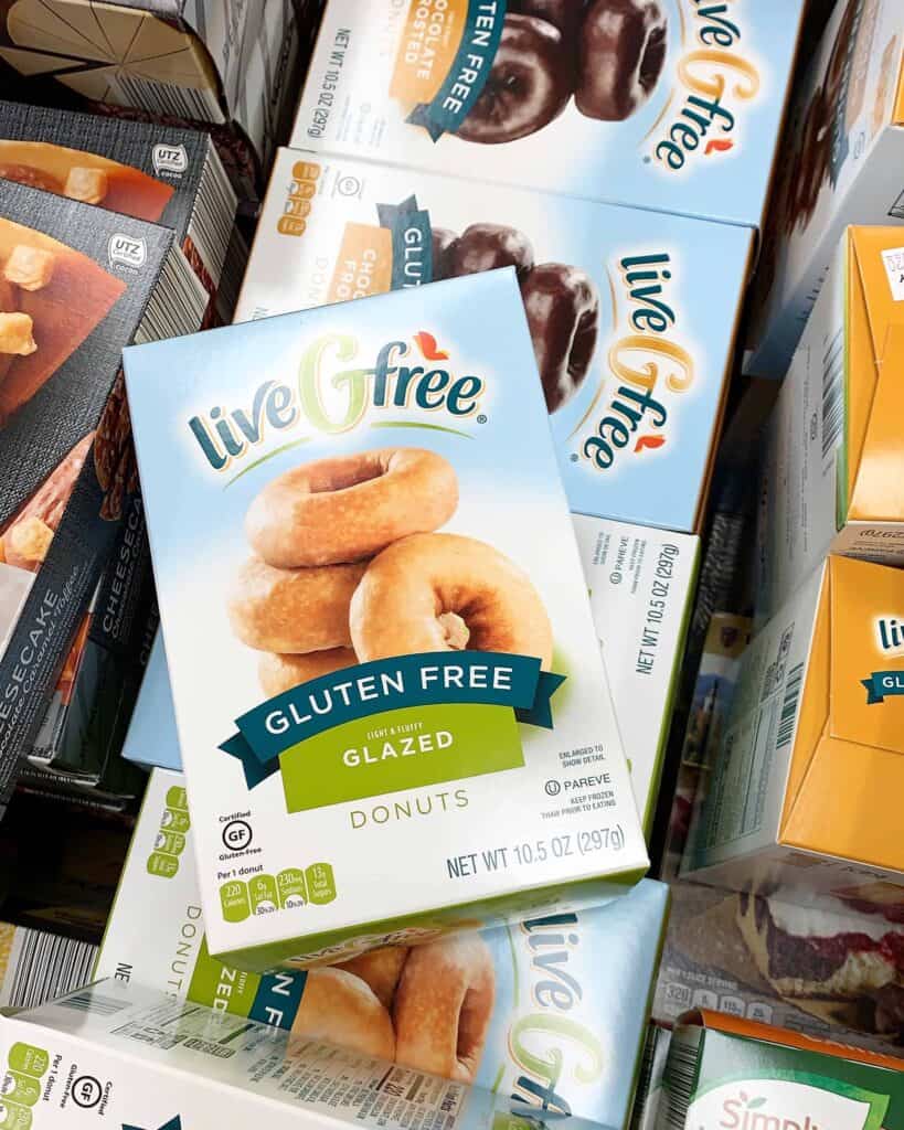 A freezer case full of Aldi Live G Free gluten free frozen donuts! Tips for gluten-free on a budget.