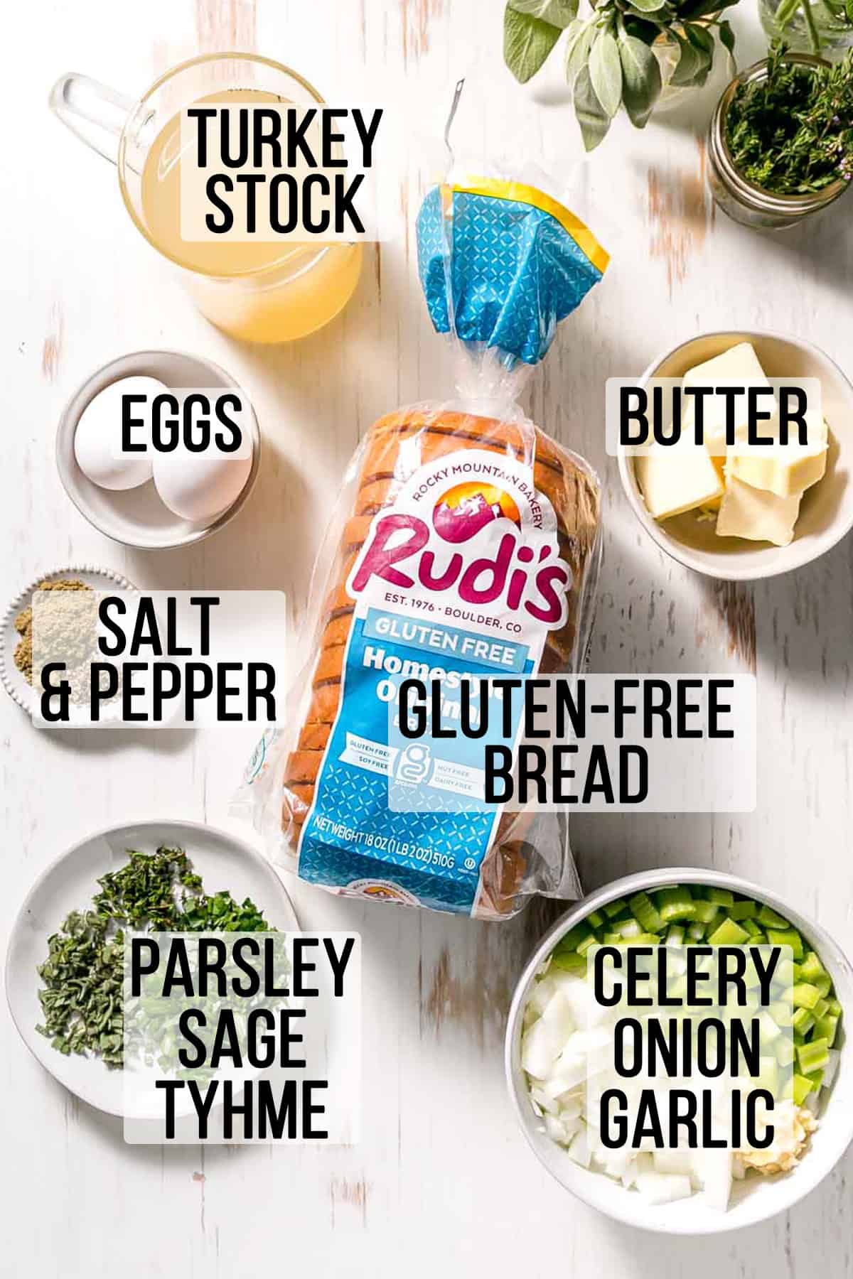 Ingredients needed for gluten-free stuffing measured out in bowls on wooden surface.