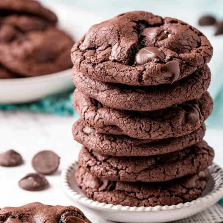 A stack of gluten-free double chocolate chip cookies.