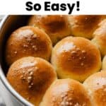 Freshly baked gluten-free dinner rolls in a baking pan, soft and fluffy with golden brown tops, made with yeast and psyllium husk for perfect rise.