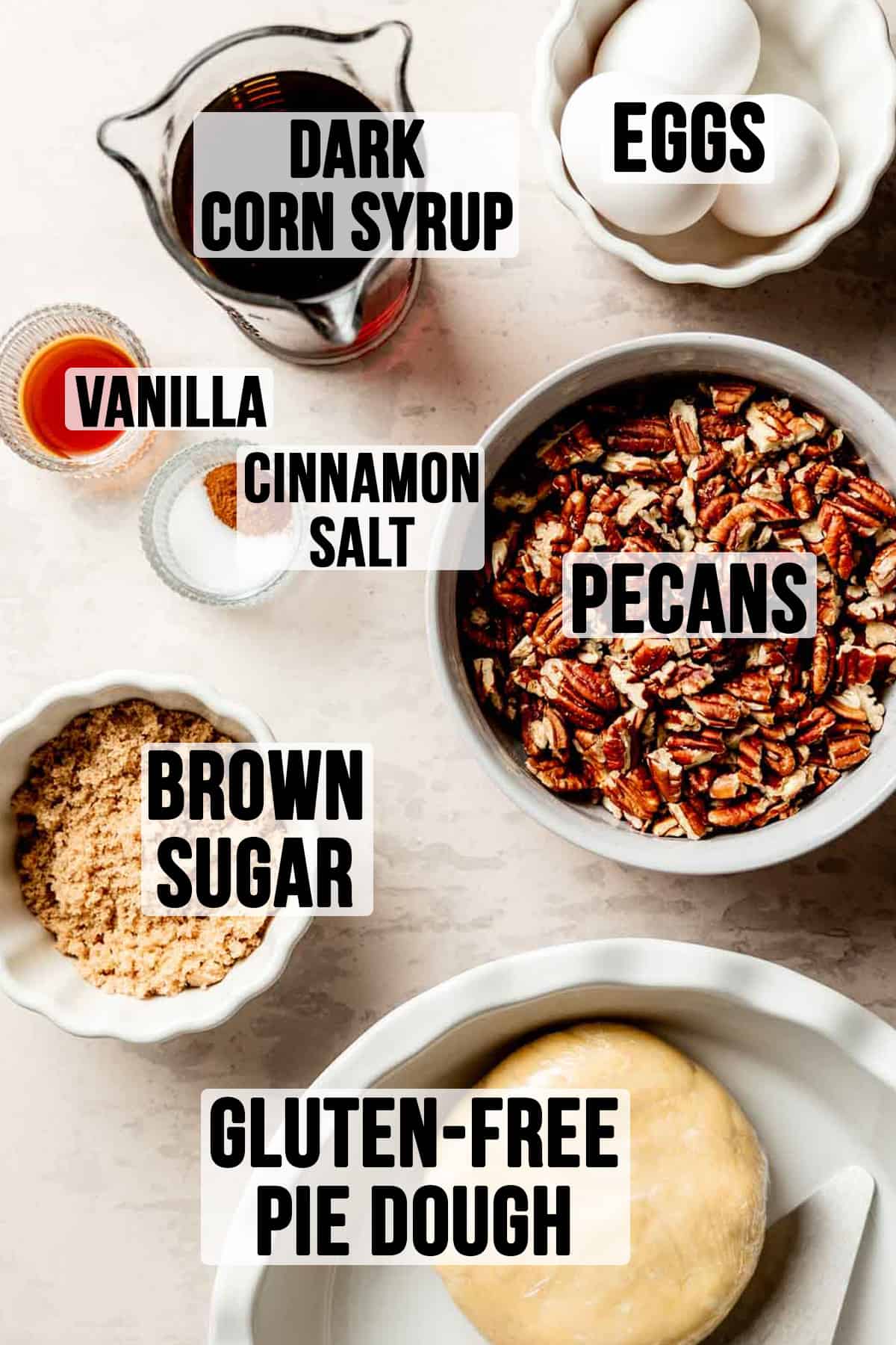 Ingredients for gluten free pecan pie measured out in bowls.