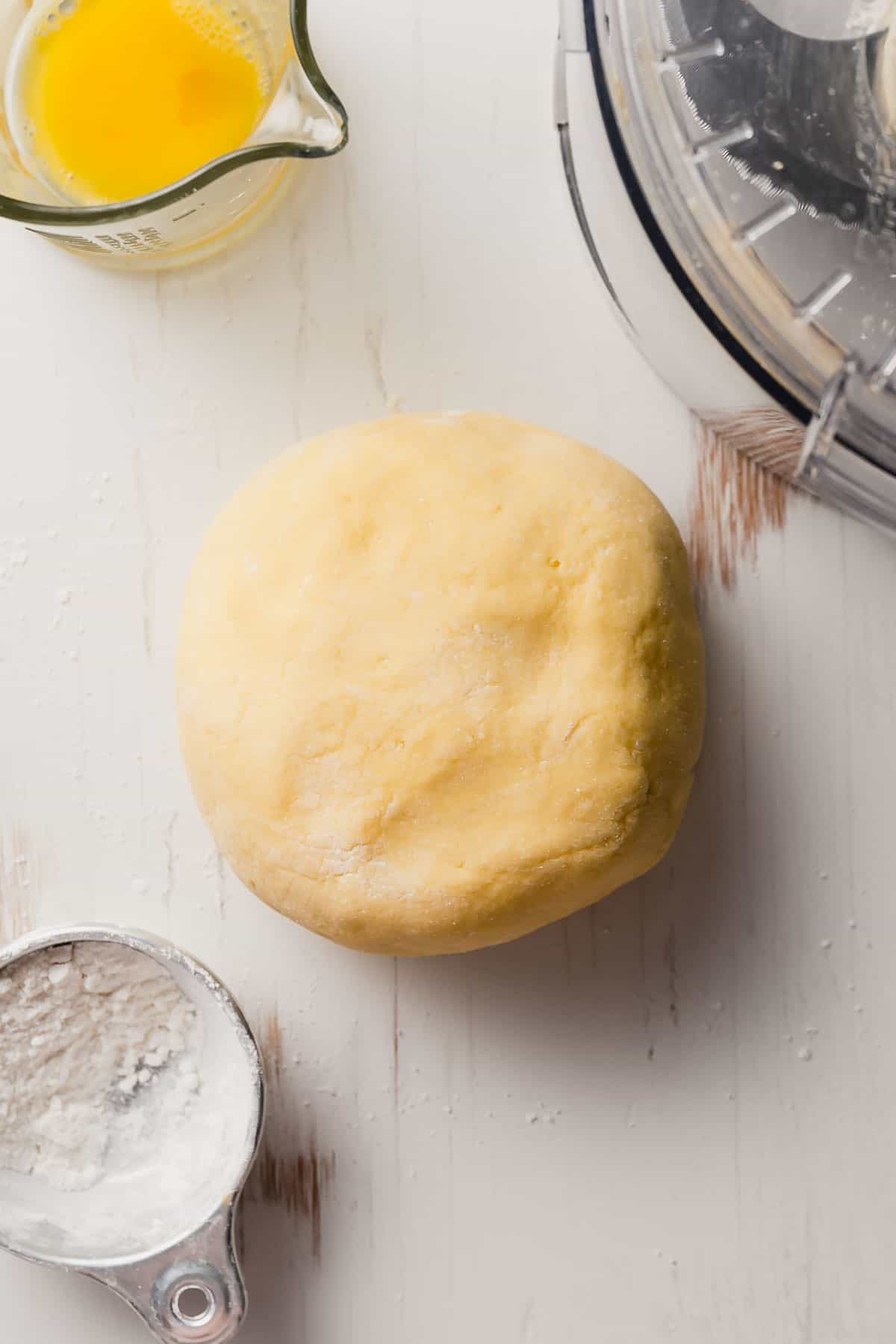 A perfect ball of pasta dough that is firm and smooth.