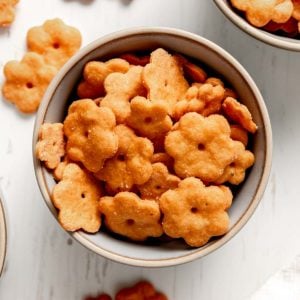 A bowl of homemade (flower-shaped) cheez-it crackers.