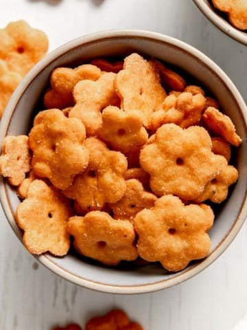 A bowl of homemade (flower-shaped) cheez-it crackers.