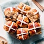 A plate full of gluten-free hot cross buns.