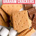 Gluten-free graham crackers on a plate with Hershey's chocolate and marshmallows.