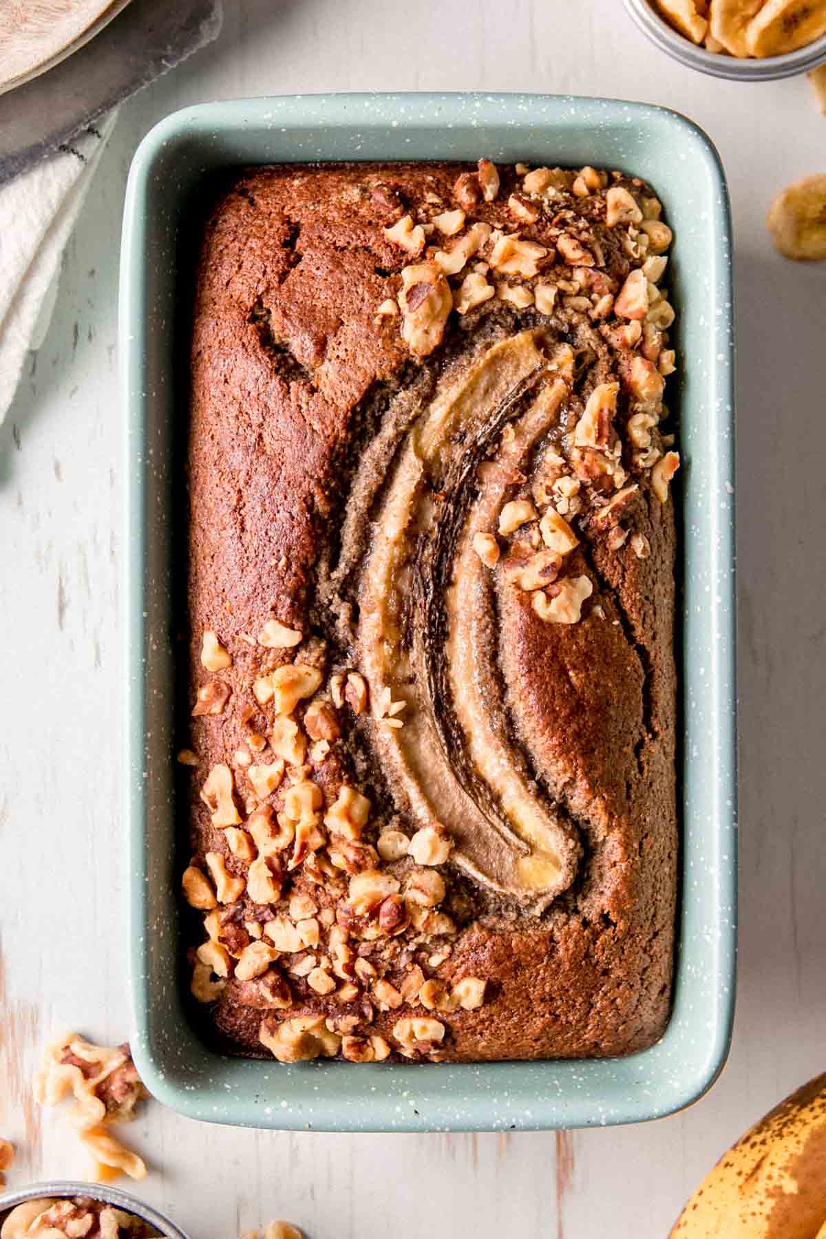 Buckwheat banana bread in speckled loaf pan.