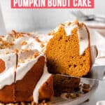 Gluten-free Pumpkin Bundt Cake with a slice on a serving spatula being lifted from the plate.