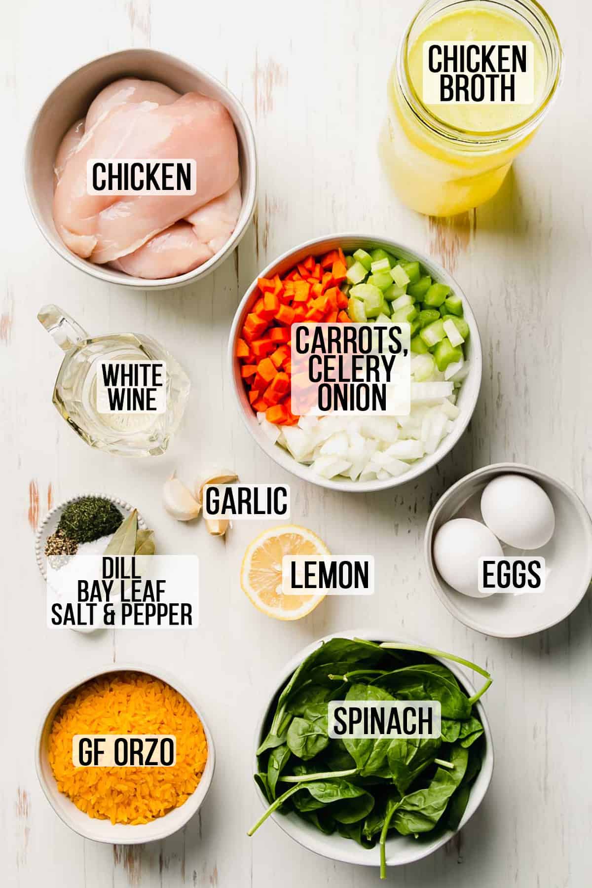 Ingredients needed for gluten-free lemon chicken orzo soup measured out in bowls.