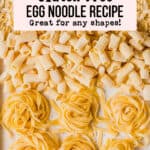A baking sheet filled with different shapes of gluten-free egg noodles.