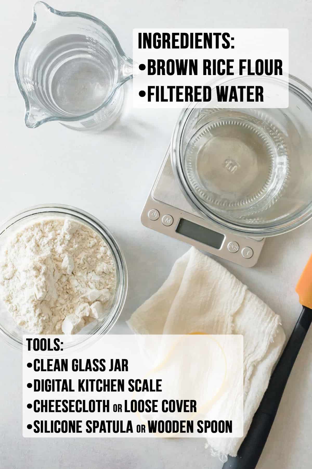 Brown rice flour, water, a clean jar, and a kitchen scale on table.