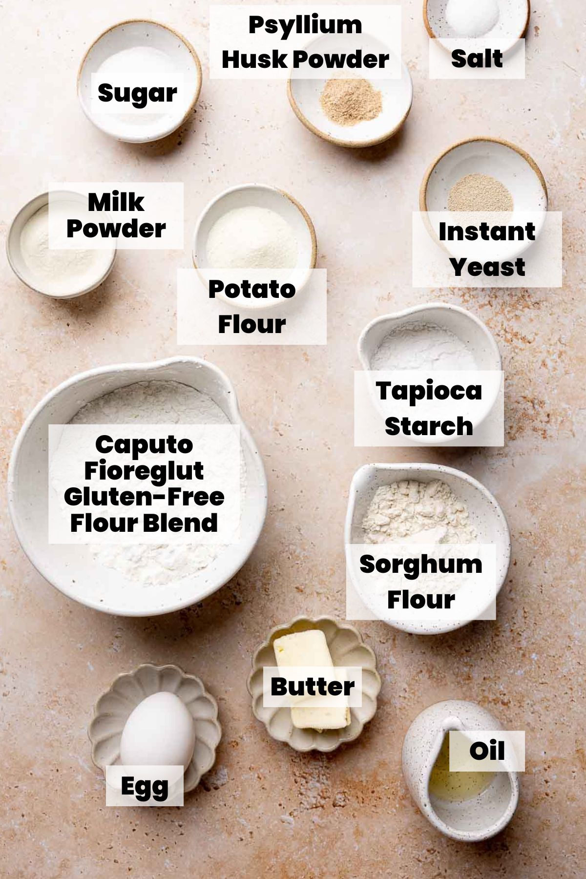 Ingredients for gluten-free crescent rolls in labeled bowls and dishes.