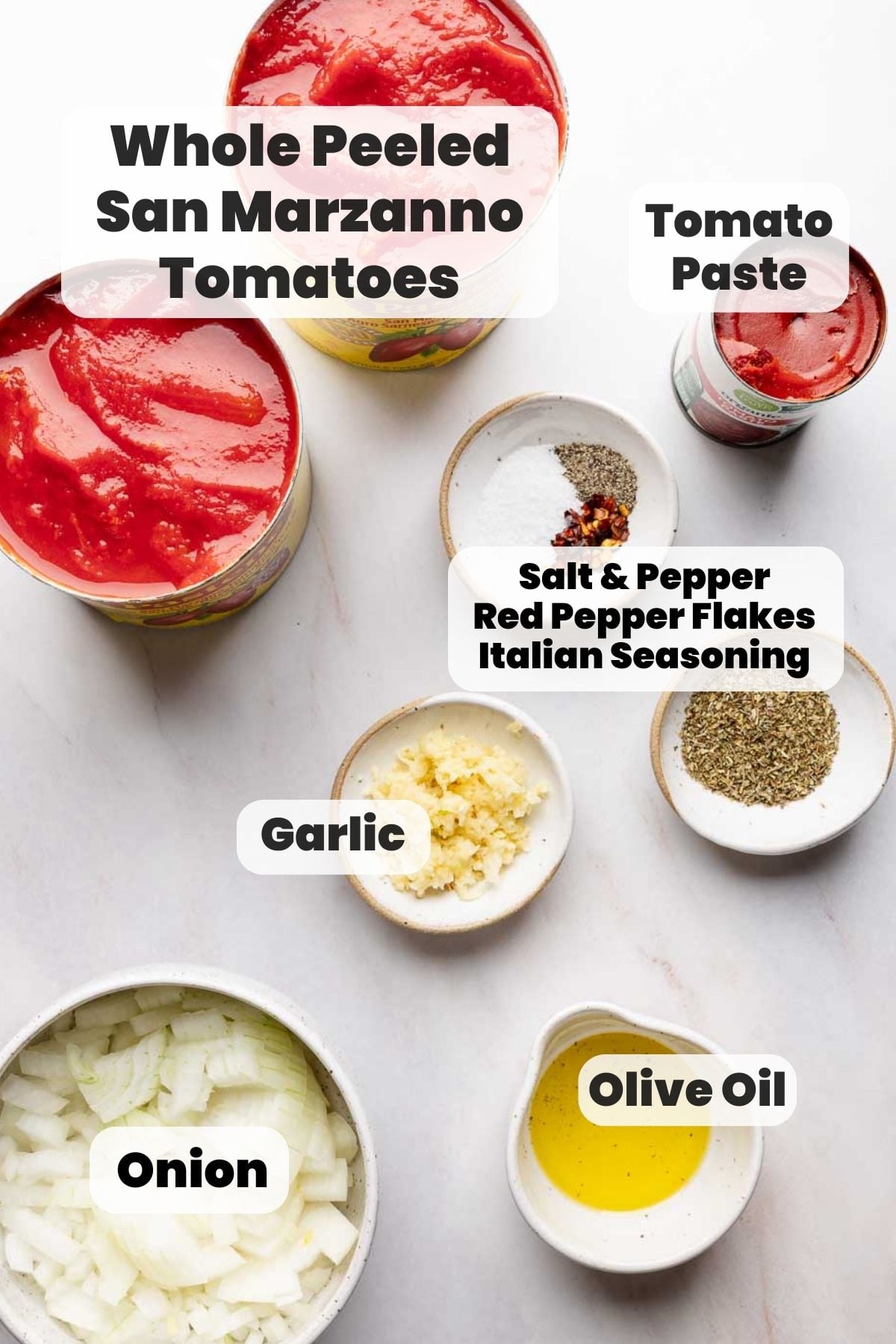 Ingredients for slow cooker spaghetti sauce measured out in bowls.