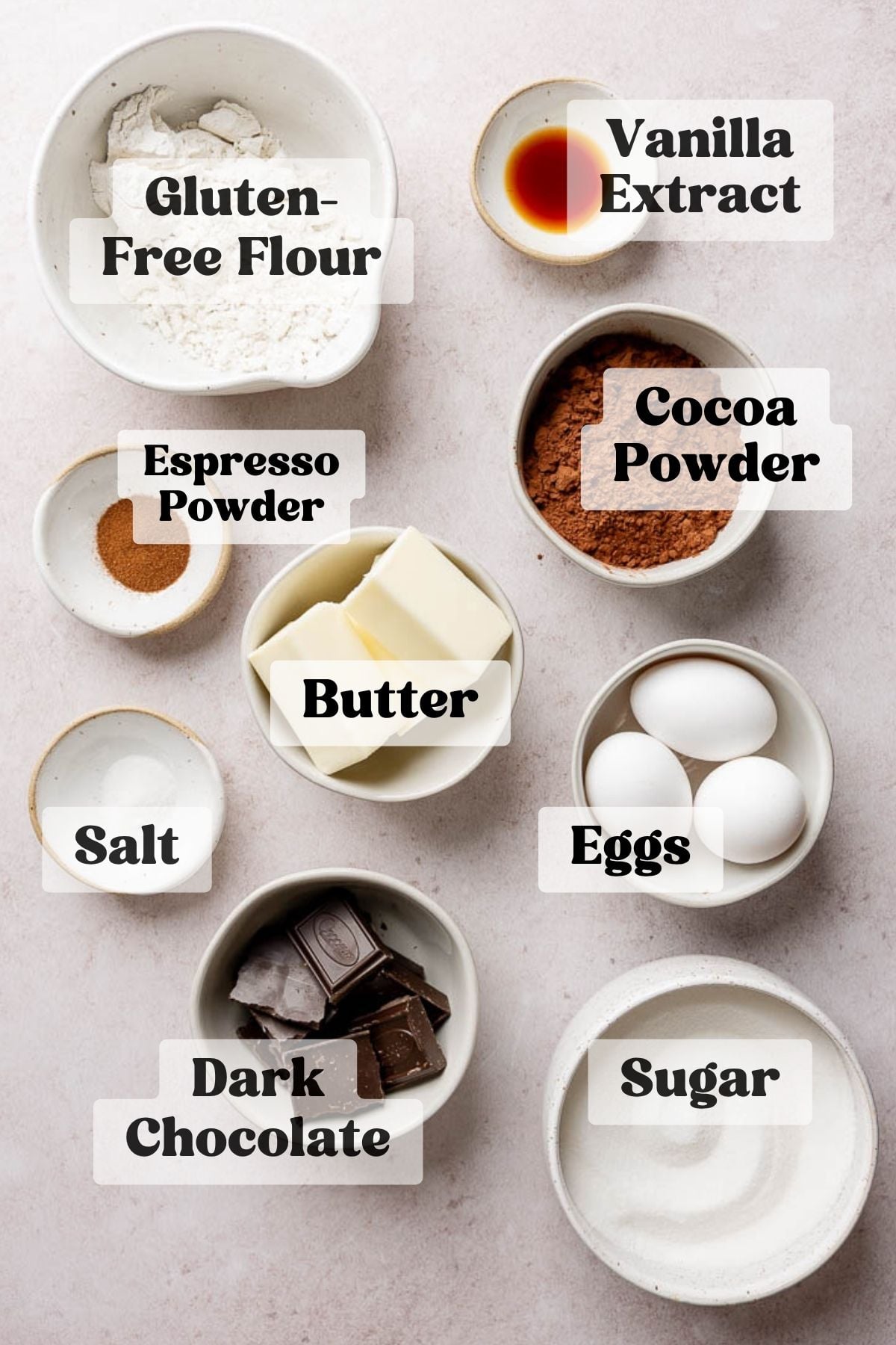 Ingredients for gluten free brownies measured out in bowls.