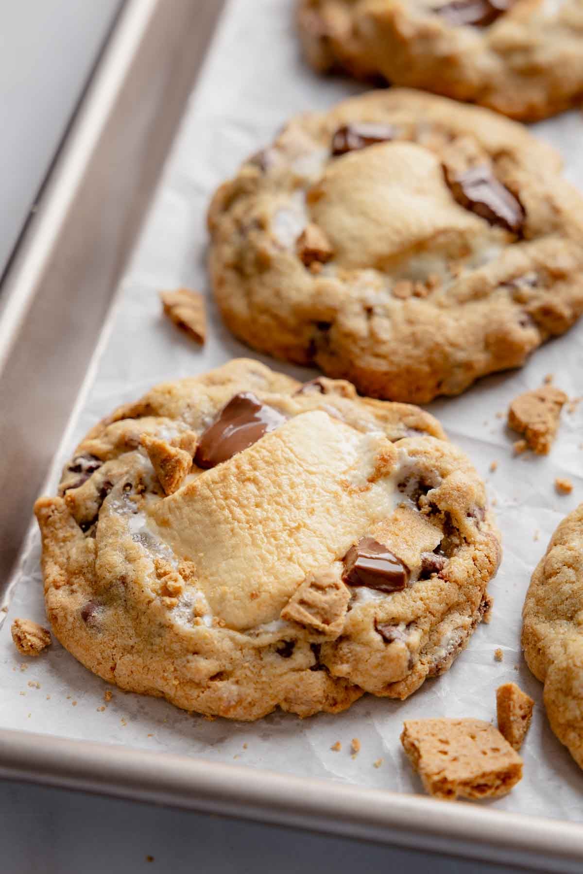 Cookies cooling on parchment lined baking sheet.