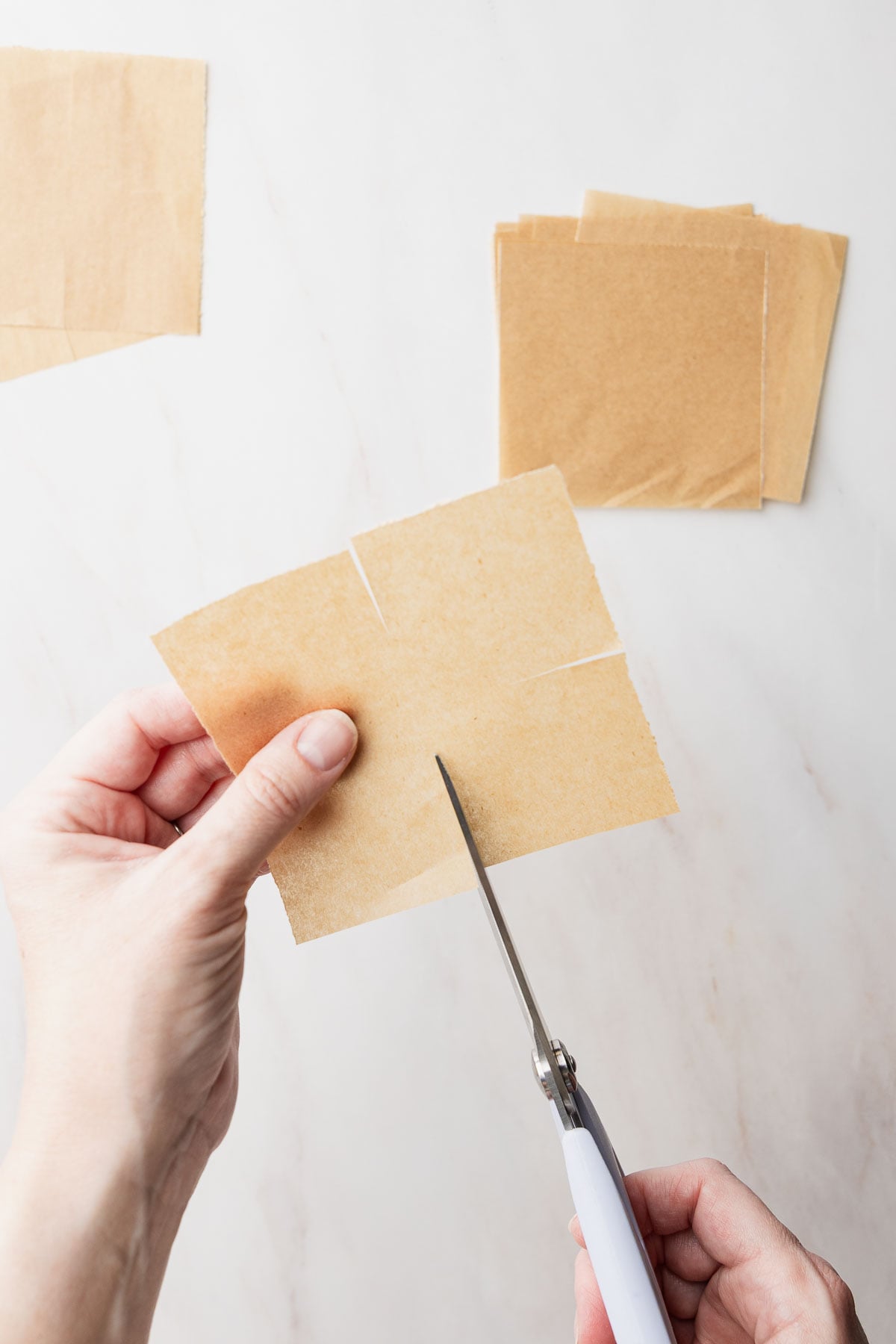 Cut slits into the side of each square.