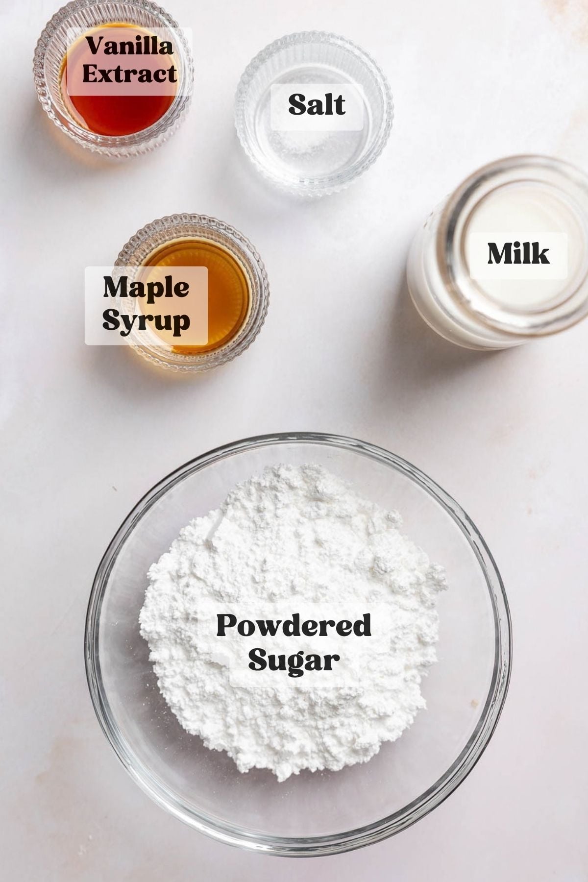 Ingredients for maple glaze measured out in bowls.