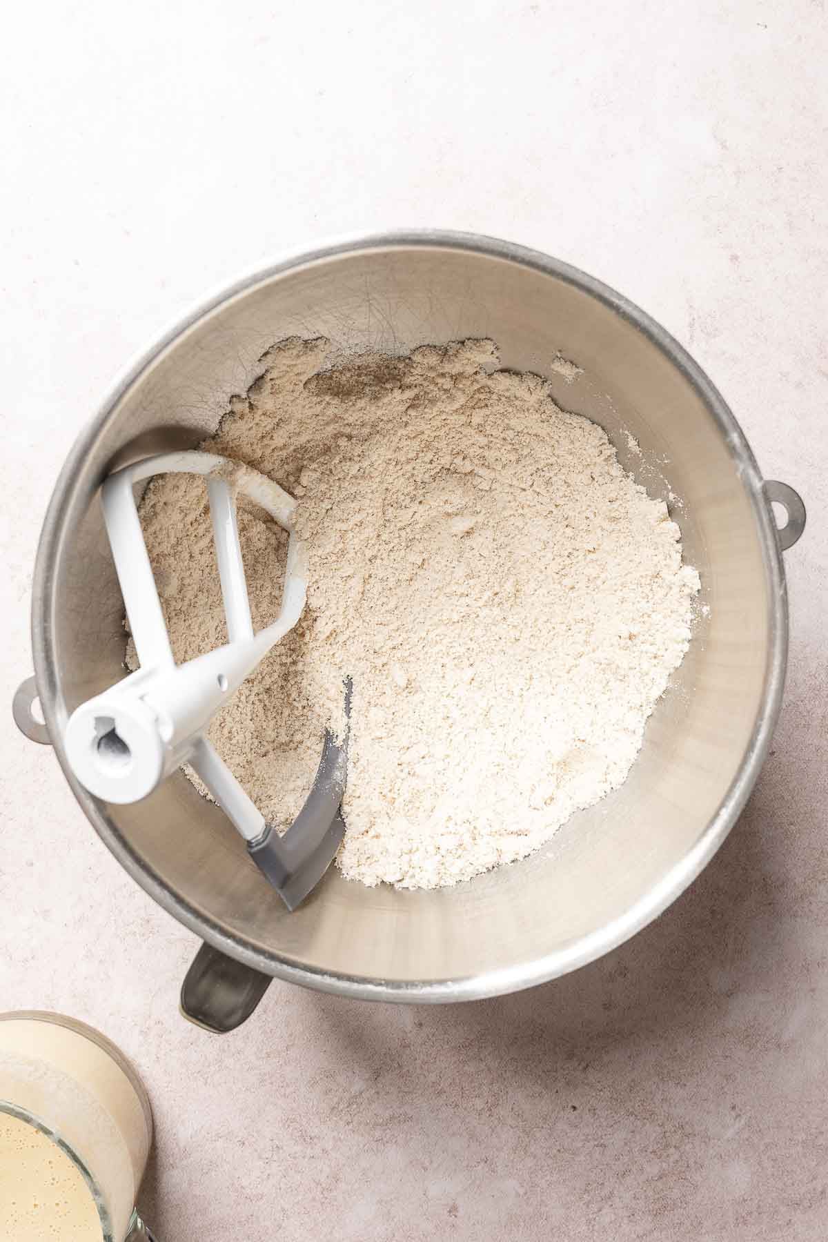 Dry ingredients and butter blended together in mixing bowl.